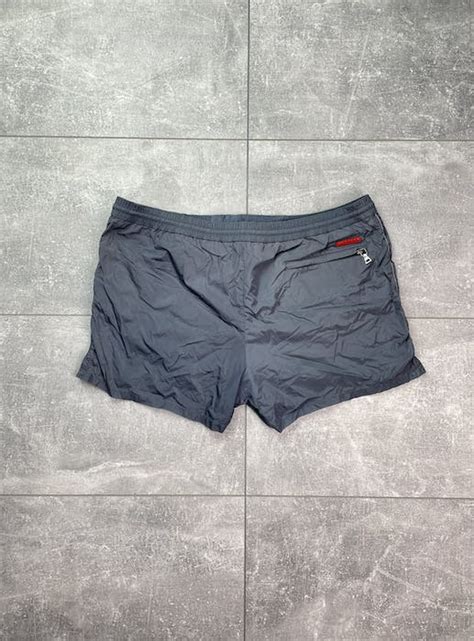 prada swim shorts red label